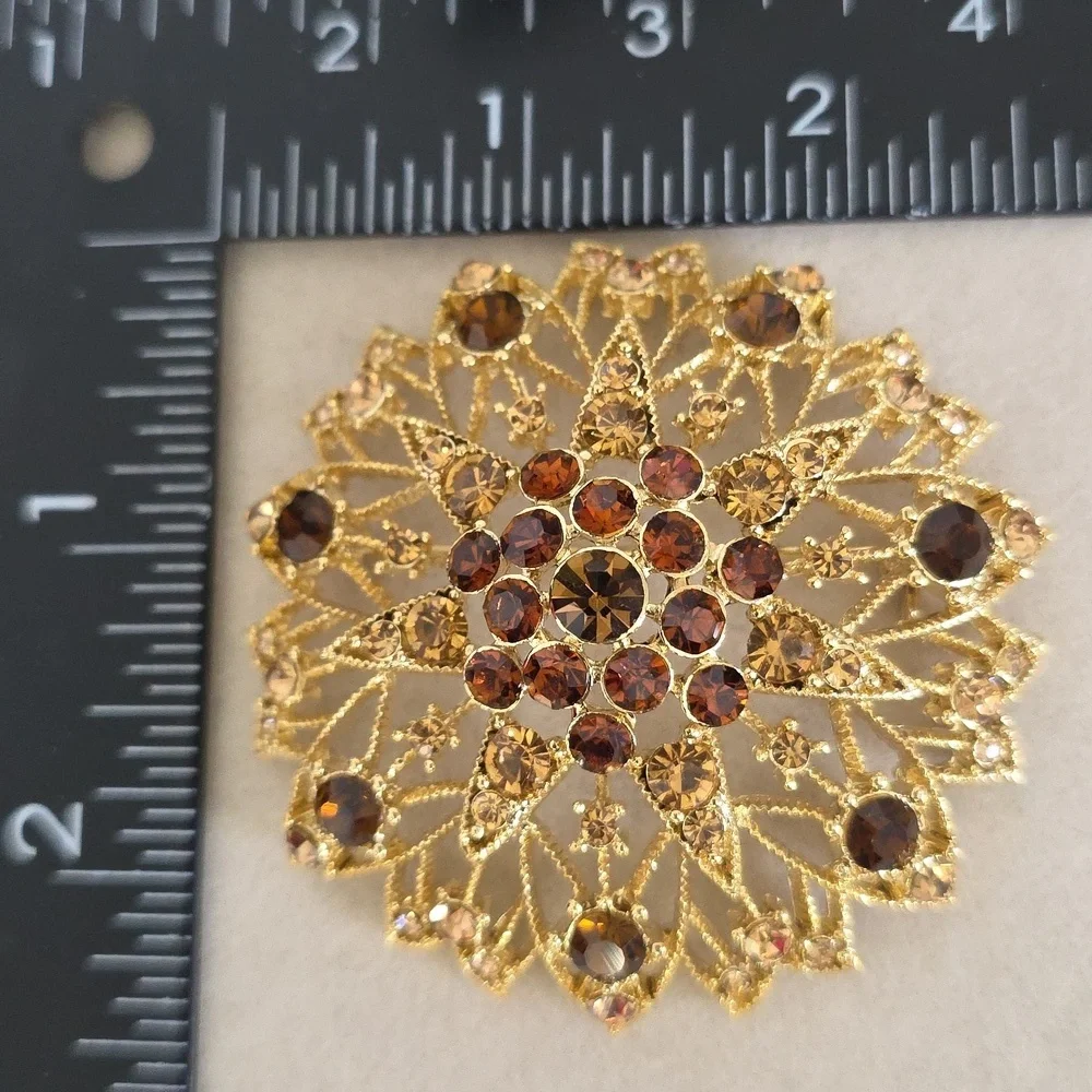 Vintage Gold Filigree Starburst Dome Brooch Pin with Topaz Color Rhimestones